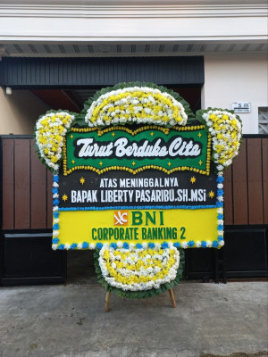 Papan Bunga Duka di Tirto