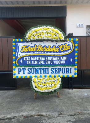 Papan Bunga Duka di Tirto
