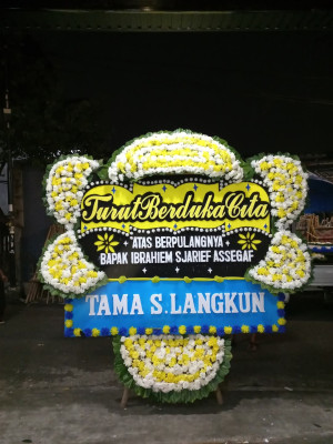 Papan Bunga Duka di Tirto