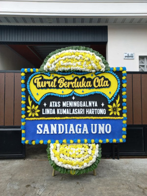 Papan Bunga Duka di Tirto