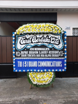 Papan Bunga Duka di Tirto